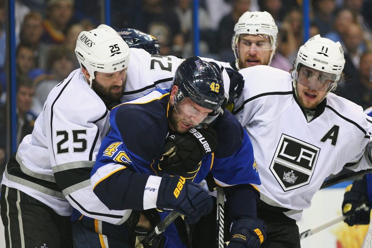 The Los Angeles Kings have to be the surprise story of the NHL playoffs thus far. The Western Conference's No. 8 seed has won all five of its road games and has knocked off the No. 1 seed Vancouver Canucks. The Kings won both games in St. Louis against the No. 2 seed Blues. (Dilip Vishwanat/Getty Images)