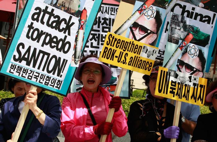 South Korean conservative protesters hold an anti-North Korea rally on May 26, in Seoul, South. North Korea's dictatorship said it is cutting all ties with South Korea and will expel all South Koreans working in Industrial Region near the border.  (Chung Sung-Jun/Getty Images)