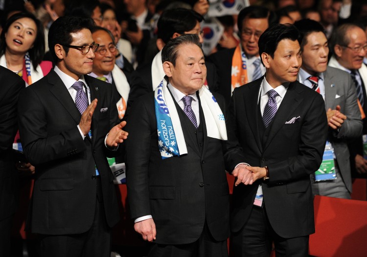 CHOSEN: Korea's Minister of Culture and Sport Byoung-gug Choung (L), IOC member Kun-Hee Lee (C) and Olympic Champion Dae Sung Moon react as Pyeongchang is chosen as the host city for the 2018 Olympic Winter Games.  (Jasper Juinen/Getty Images )