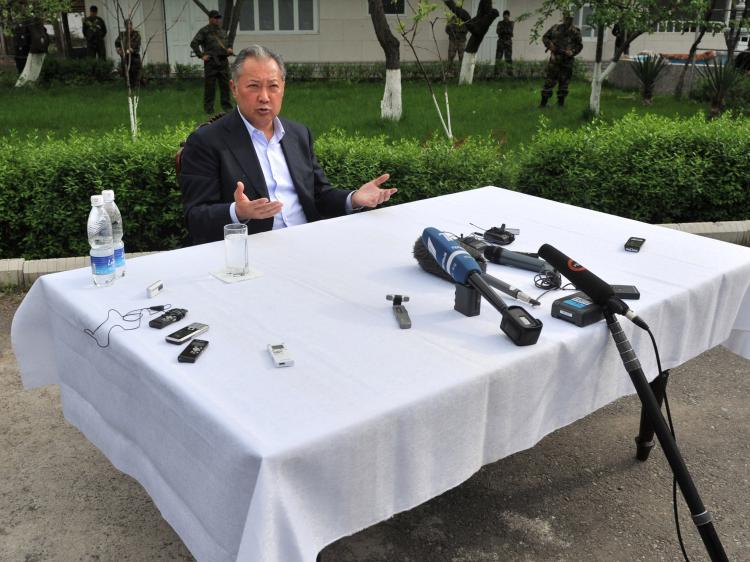 Ousted Kyrgyzstan president Kurmanbek Bakiyev at a news conference in Teyit on April 13. Kyrgyzstan's toppled president Tuesday offered to resign for the first time since he was ousted in protests, but only if he received security guarantees from his foes (VYACHESLAV OSELEDKO/AFP/Getty Images)