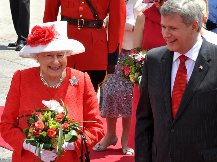 CANADA'S SOVEREIGN LEADER: Her Majesty Queen Elizabeth and Canadian Prime Minister Stephen Harper arriving at Parliament Hill for the Canada Day celebration on July 1. (Pam McLennan/Epoch Times)