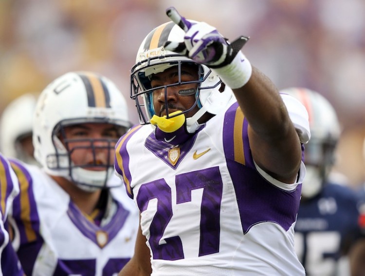 Kenny Hilliard of LSU celebrates a TD against Auburn on Saturday. The Tigers remained No. 1 in the AP polls, but will face No. 2 Alabama this Saturday. (Jamie Squire/Getty Images)