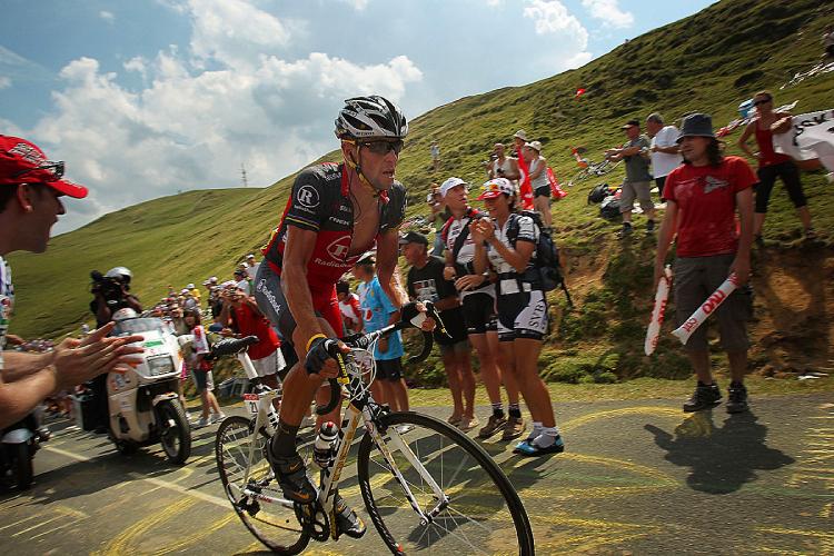 Fans cheer on Lance Armstrong as he climbs the Col d'Aubisque during Stage 16 of the 2010 Tour de France (Joel Saget/AFP/Getty Images)