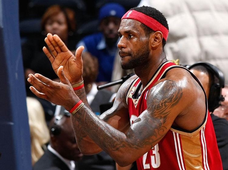 FOLLOW THROUGH: After a huge first half, LeBron James's good defense and last second foul shots sealed the win over the Miami Heat for the Cleveland Cavaliers. (Kevin C. Cox/Getty Images) FOLLOW THROUGH: After a huge first half, LeBron James's good defense and last second foul shots sealed the win over the Miami Heat for the Cleveland Cavaliers. (Kevin C. Cox/Getty Images)