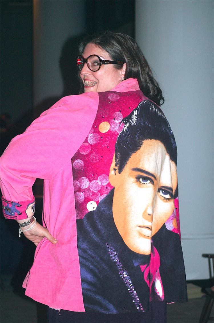 Linda Martin models her Elvis coat. (Mary Silver/The Epoch Times)