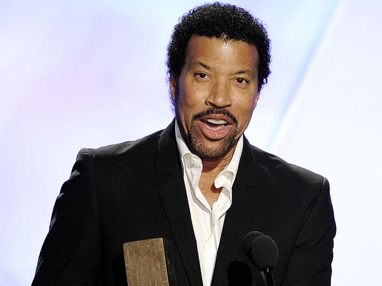 Lionel Richie, here performing at the Noble Awards, and Quincy Jones may be teaming up for a 25th anniversary remake of 'We are the World.' (Kevin Winter/Getty Images for The Noble Awards)