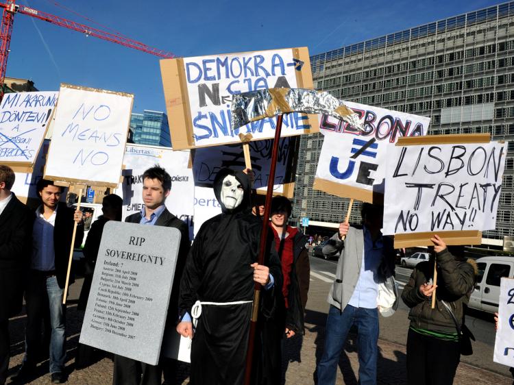 Activists of the eurosceptic party 'Libertas' demonstrate on March 18, 2009 against the Lisbon treaty, in front of the EU Commission headquater in Brussels. (Dominique Faget/Getty)