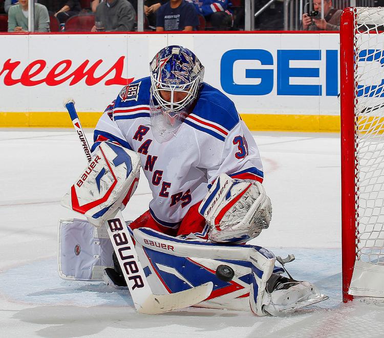 COMES UP BIG: New York Rangers goalie Henrik Lundqvist won the shootout battle against Carolina's Cam Ward on Tuesday. (Paul Bereswill/Getty Images)