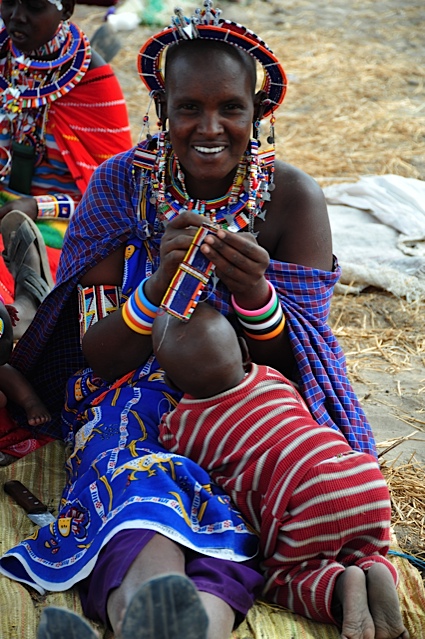  Maasai women create beadwork in their village for sale 