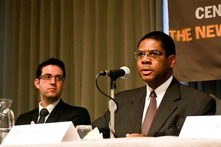 Richard W. Eaddy (R), vice chairman of the City Planning Commission, and Brian Cook (L), director of land use and planning for the Manhattan borough president's office, discuss community-based planning on a panel at The New School's Center for New York City Affairs on Thursday. (Tara MacIsaac/The Epoch Times)