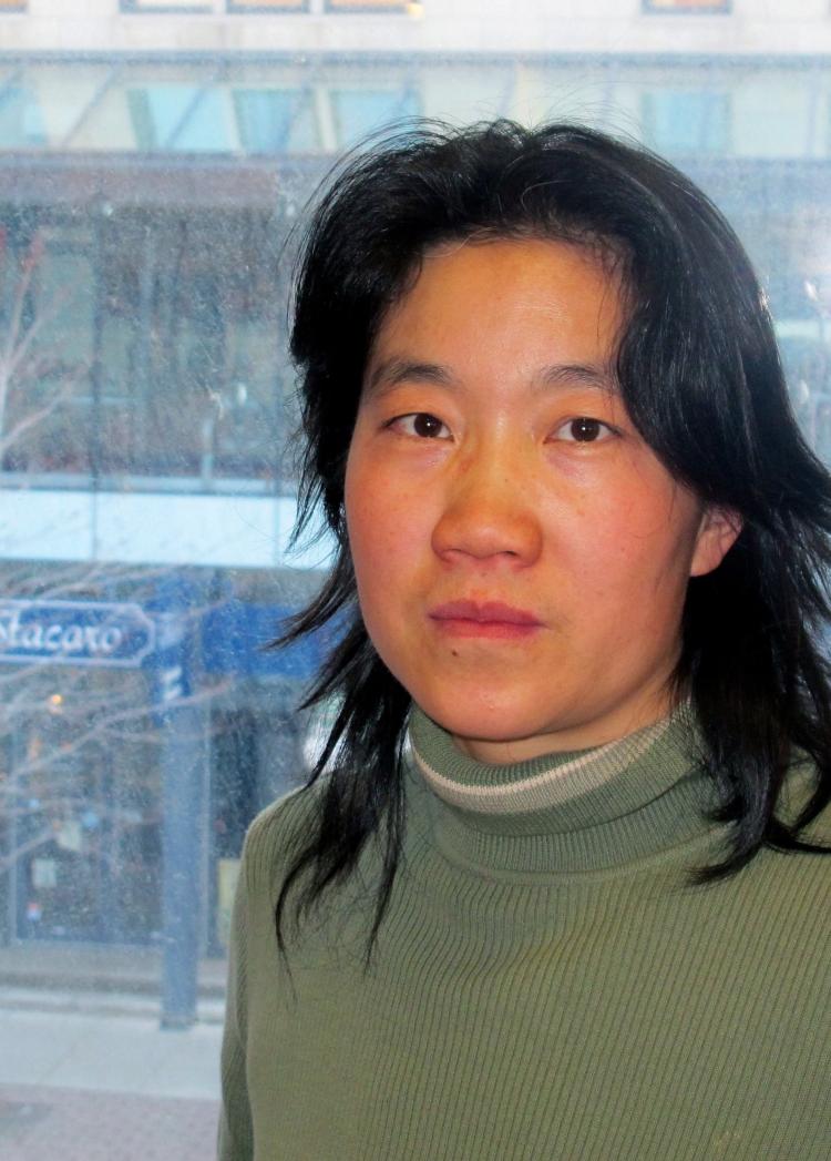 Democracy activist Maggie Wenzhuo Hou says ongoing problems with her Internet and phone connections are the work of Chinese security agents operating in Canada. (Pam McLennan/The Epoch Times)