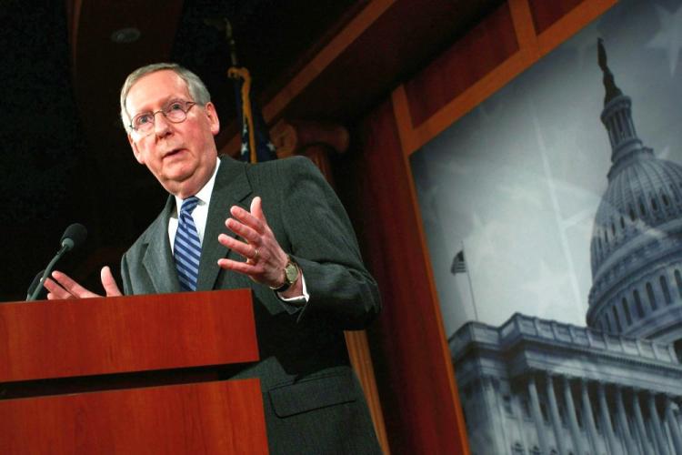 Senate Minority Leader Mitch McConnell (R-Ky.) speaks during a press conference on the economic stimulus legislation held at the U.S. Capitol in Washington. (Win McNamee/Getty Images)