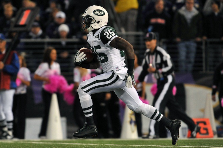 Jet's running back Joe McKnight's 107 yard kickoff return highlighted his stellar performance against Baltimore. (Larry French/Getty Images)