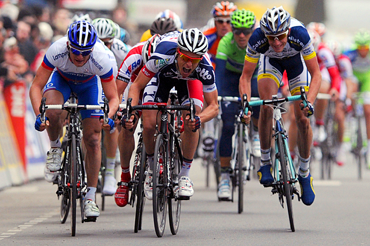 Gianni Meersman (C) sprints to victory in Stage Four of the Paris-Nice cycling race. (Pascal Pavani/AFP/Getty Images)