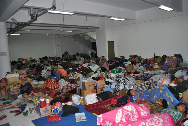 WAITING IT OUT: Refugees from Indonesia's Mount Merapi volcanic eruption sleep in close quarters at Maguo Harjo Stadium, in Sleman, Yogyakarta, on Nov. 15. (Wayan Manuh/The Epoch Times)