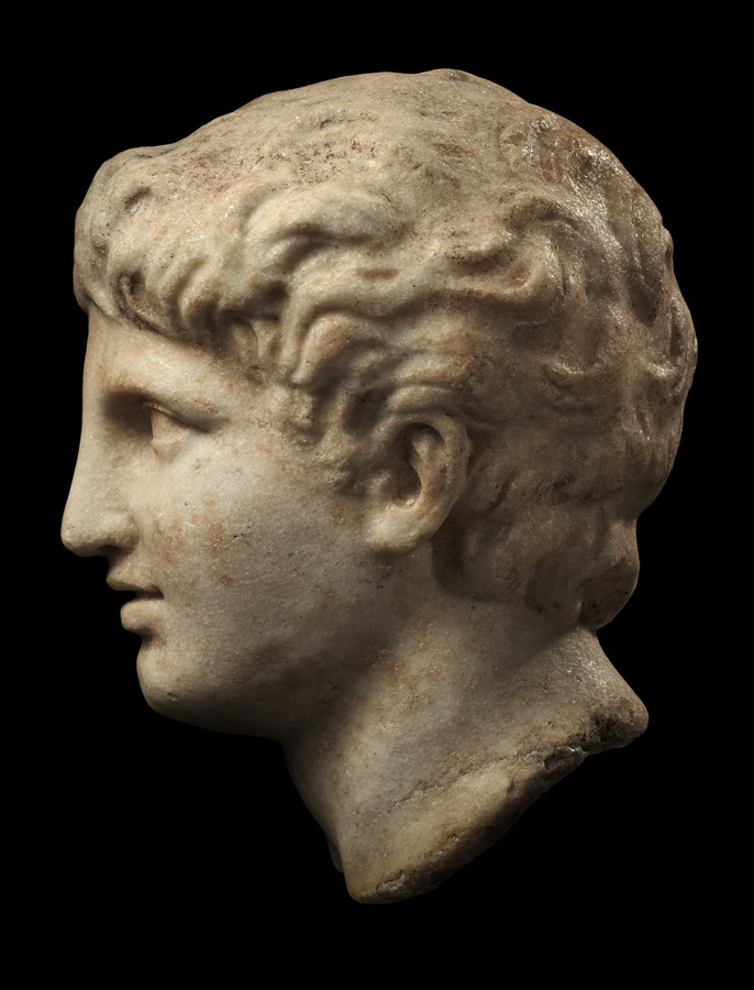 Ancient Greek head of a young man, profile. (Merrin Gallery) 