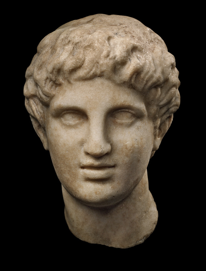 Ancient Greek head of a young man, ca. 3rd-2nd century BC. (Merrin Gallery) 