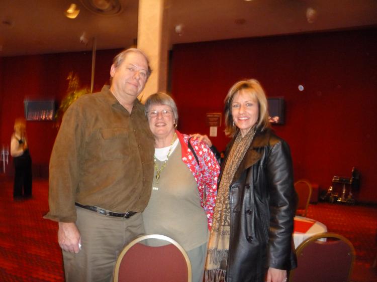 Ms. Mimi Boheme (R), an artist and art educator, attends the show with her parents, Nancy and Don, while visiting San Diego.
