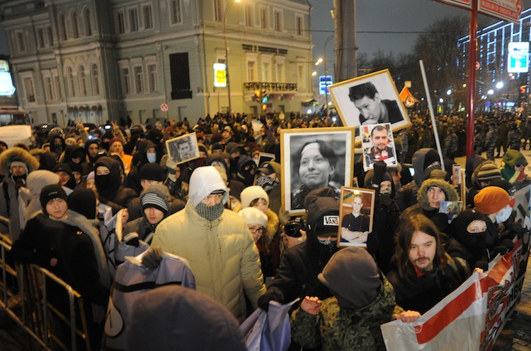 People hold portraits of killed journalists and lawyers during a rally at the Pushkinskaya Square in central Moscow, on Jan. 19, 2012. A journalist who worked for a state-run broadcaster was shot and killed in the North Caucasus on Dec. 5. (Andrey Smirnov/AFP/Getty Images) 