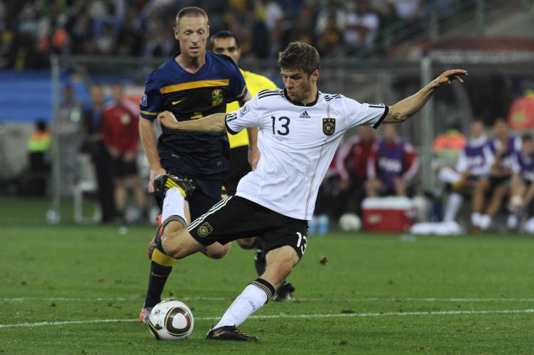 Thomas Muller gets his first international goal for Germany. He nailed Germany's third goal in an easy win over Australia.
