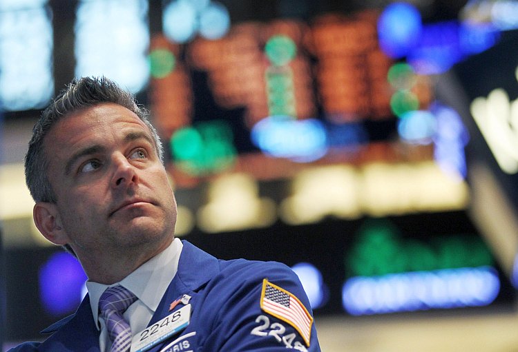 A trader works on the floor of the New York Stock Exchange