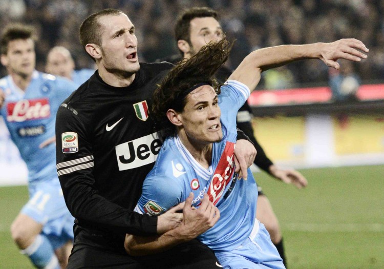 Juventus central defender Giorgio Chiellini (L) battles with Napoli striker Edinson Cavani at San Paolo Stadium in Naples, Italy on Mar. 1. (Roberto Salomone/AFP/Getty Images)