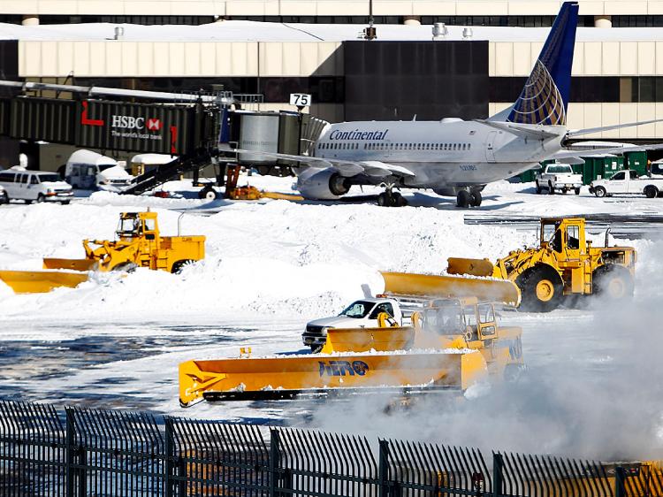 Snow removal equipment operates at Newark Liberty International Airport Terminal B following a major blizzard on December 27, 2010 in Newark, New Jersey. (Jeff Zelevansky/Getty Images) Snow removal equipment operates at Newark Liberty International Airport Terminal B following a major blizzard on December 27, 2010 in Newark, New Jersey. (Jeff Zelevansky/Getty Images)