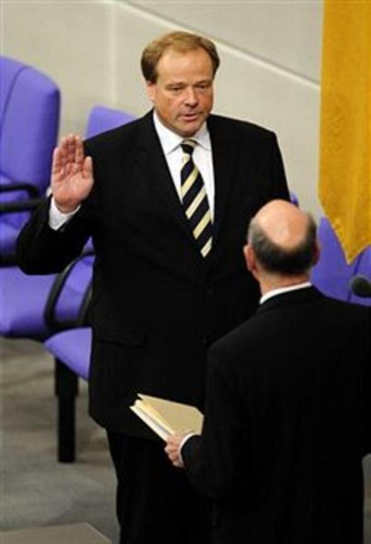 Germany's new Foreign Aid Minister Dirk Niebel taking the oath of office. (John Macdougall/AFP/Getty Images)