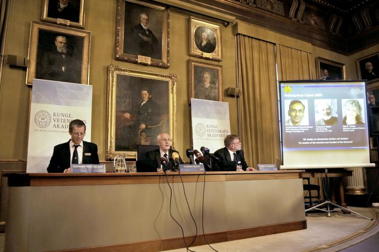 (From L) Photos of Venkatraman Ramakrishnan and Thomas Steitz of the US and Israel's Ada Yonath are displayed on a screen as they win the Nobel Chemistry Prize 2009 for their studies on the ribosome, on October 7, 2009 in Stockholm. (Olivier Morin/AFP/Getty Images)