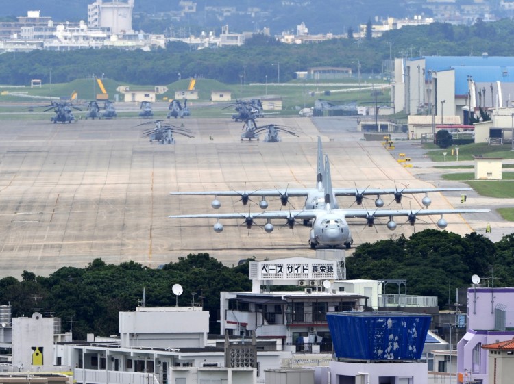 TOO CLOSE FOR COMFORT: U.S. Marine Corps Air Station Futenma, located in the middle in the city of Ginowan, is the most controversial American military facility in Japan's Okinawa prefecture. (Toshifumi Kitamura/AFP/Getty Images)