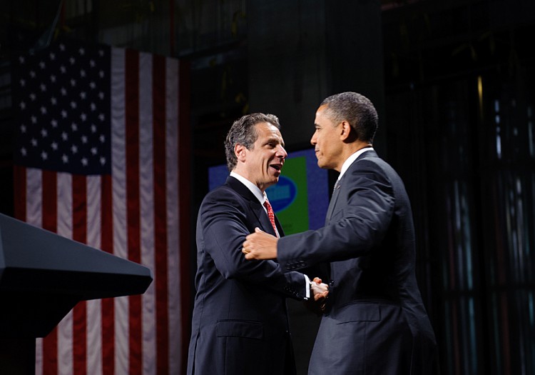 President Barack Obama embraces New York Governor Andrew Cuomo