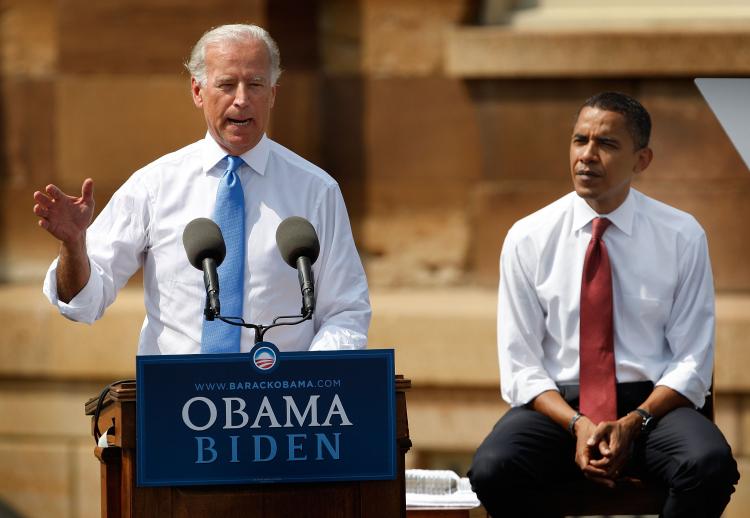 OBAMA AND BIDEN: Democratic presidential candidate Senator Barack Obama (D-IL) (R) and Senator Joe Biden (D-DE) address people gathered for a rally on the lawn of the Old State Capital Aug. 23 in Springfield, Illinois. (Scott Olson/Getty Images)