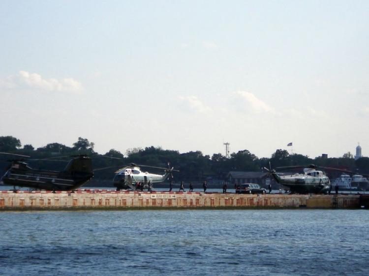 President Obama and his wife Michelle Obama are escorted off a helicopter near Pier 11 in Manhattan on May 30. The two went on a date to dinner and to see a Broadway show. (Courtesy of Trisha Deniega)