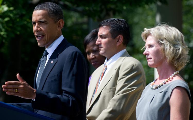Obama speaks in the White House Rose Garden Monday to Urge Senators to Fund Unemployment Benefits. He is joined by three jobless Americans, (R-L) Leslie Macko, from Charlottesville, VA, Jim Chukalas, from Fredon Township, NJ, Denise Gibson from NY.  (Saul Loeb/Getty Images)