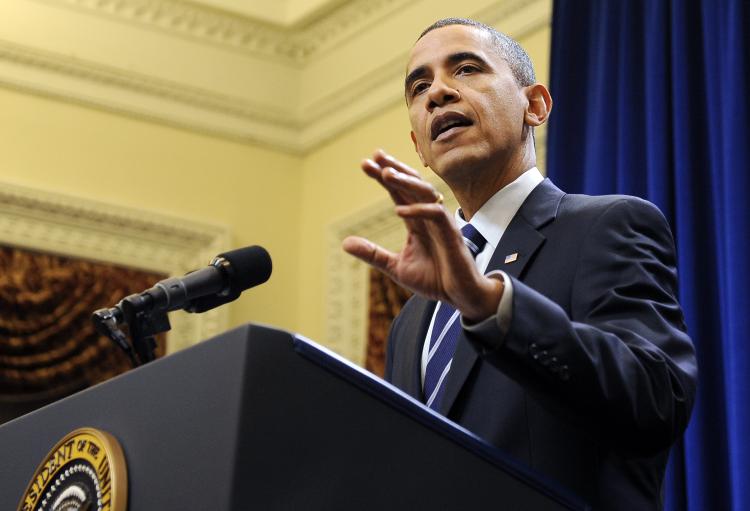 President Barack Obama addresses a bipartisan deal to extend expiring tax cuts for two years and extend unemployment benefits for 13 months. (Roger L. Wollenberg/Getty Images)