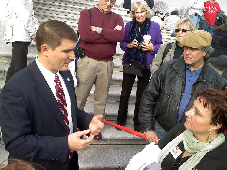 Ohio Congressman John Boccieri speaks with US-politics-health-constituents Beth Williams (R), from Canton, Ohio, in November 2009. (MICHAEL MATHES/AFP/Getty Images)