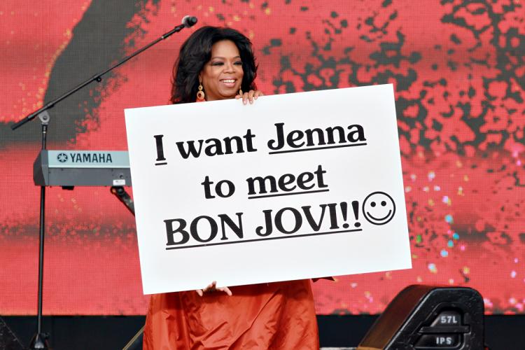 SYDNEY, AUSTRALIA - Oprah Winfrey holds up a poster during the first taping of the 'Oprah Winfrey Show' at the Sydney Opera House on December 14, 2010 in Sydney, Australia. (George Burns/Harpo Productions Inc. via Getty Images)