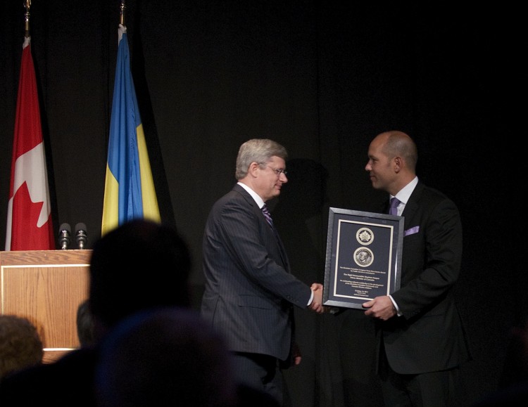 Prime Minister Stephen Harper received the Shevchenko Medal Award from Ukrainian Canadian Congress President Paul Grod on Friday. (Matthew Little/The Epoch Times)