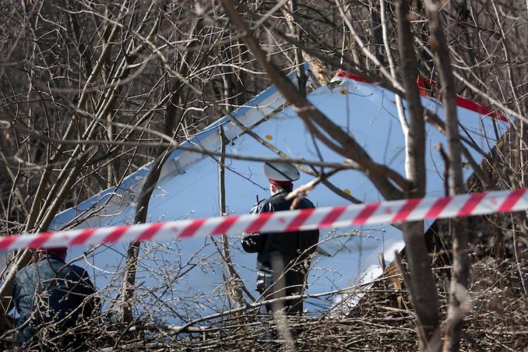 Russian policemen cordon off the wreckage of a Polish government Tupolev Tu-154 aircraft that crashed near Smolensk airport on April 10.  (Maxim Malinovsky/Getty Images)