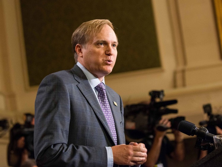 NDP natural resources critic Peter Julian, seen here Sept. 19, 2012, told reporters Thursday that the NDP had decided to oppose Nexen's takeover by CNOOC