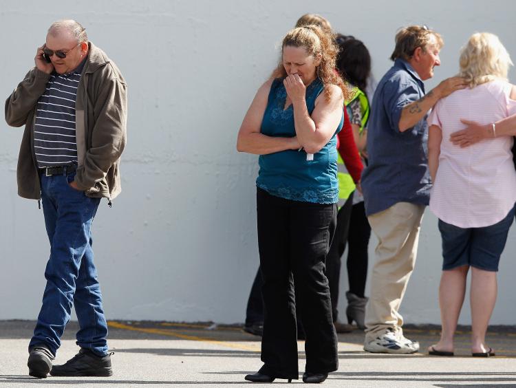 Families grieving after hearing news of second explosion at Pike River Coal Mine. (Martin Hunter Getty Images)