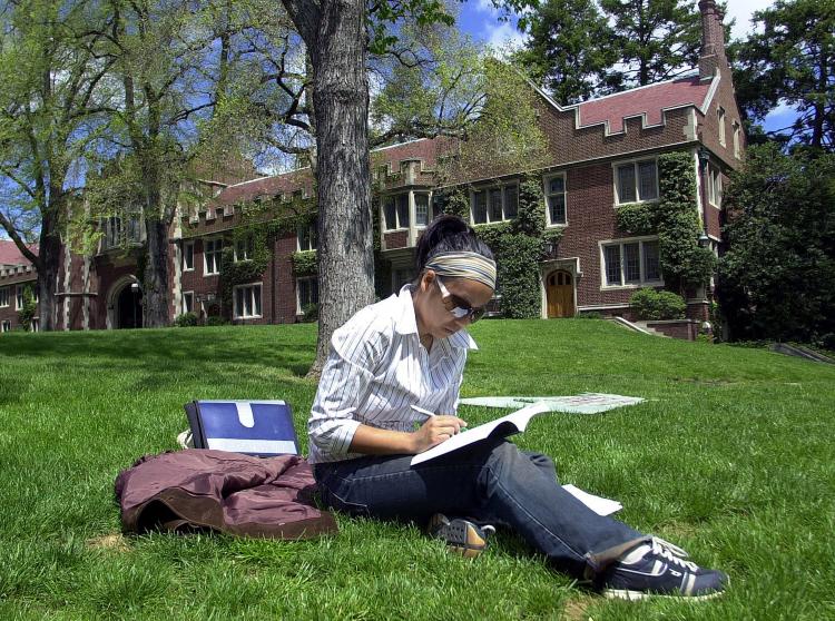 IMPORTANCE OF EDUCATION: A university student doing homework on campus. According to the Canadian Council on Learning, from 1990 to 2007, the number of jobs requiring a post-secondary qualification almost doubled, while the number of jobs that did not require one was halved. (William Thomas Cain/Getty Images)