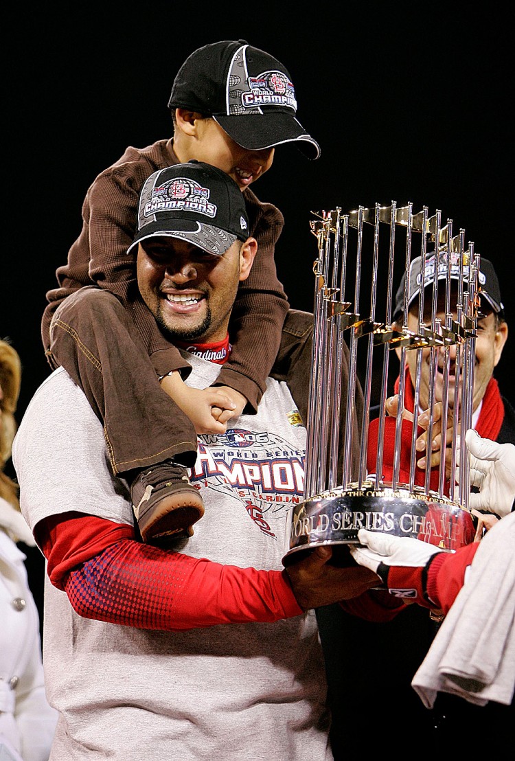 BEST IN SHOW: Though Albert Pujols is generally regarding as the best hitter of his generation the slugger would have to elevate his already-stellar numbers to break some of baseball's biggest records. (Jed Jacobsohn/Getty Images)