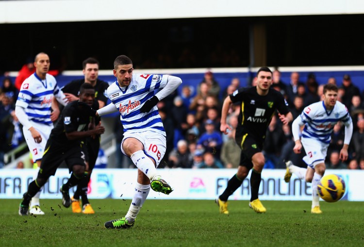 QPR's Adel Taarabt takes a penalty kick in the second half against Norwich City in English Premier League action in London on Feb. 2, 2013. (Paul Gilham/Getty Images) 