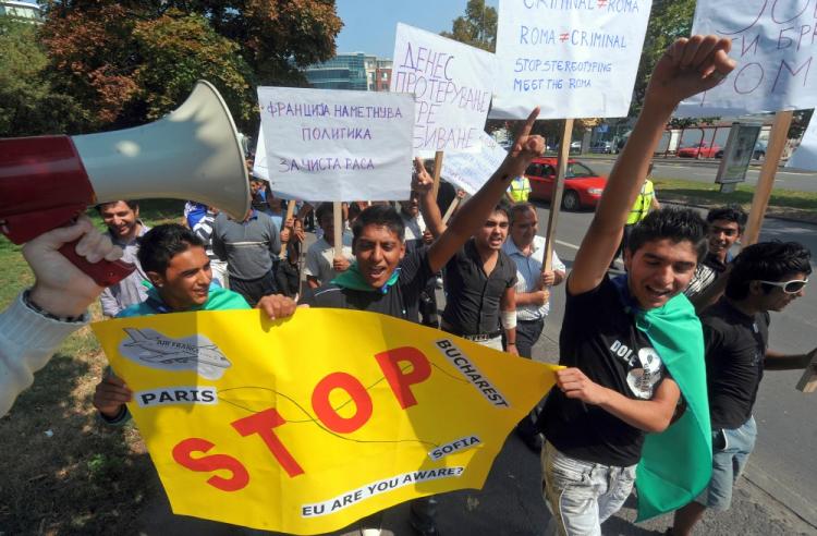 Roma people from Macedonia take part in a demonstration to protest against the French government's immigration policy, especially the deportation of the Roma minority, on Sept. 6 in front of the French Embassy in Skopje. (Robert Atanasovski/AFP/Getty Images )