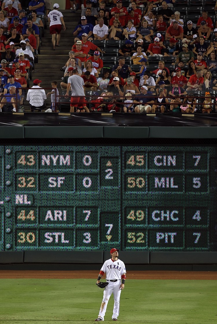 FATAL FIELD: Josh Hamilton of the Texas Rangers plays in the outfield against the Oakland Athletics at Rangers Ballpark in Arlington, Texas.  (Ronald Martinez/Getty Images)