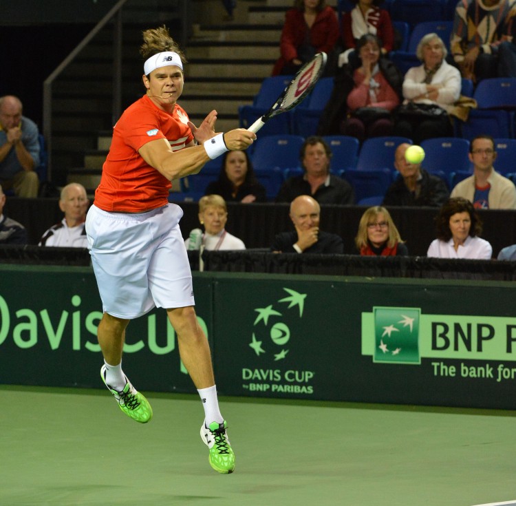 Milos Raonic of Canada fires a forehand against Spain's Guillermo Garcia-Lopez on Sunday at the Thunderbird Sports Centre in Vancouver. Canada advanced past Spain in Davis Cup to reach the quarterfinals. (Don MacKinnon/AFP/Getty Images) 