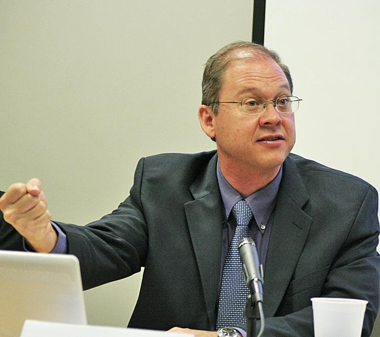 REBALANCE: Christopher A. McNally says that Chinese communist leaders are serious now about making changes toward a more consumption-driven economy. Dr. McNally is director of the China-U.S. Relations Program, University of Hawaii-Hilo. He spoke April 12 at the East-West Center in Washington. (Gary Feuerberg/The Epoch Times)