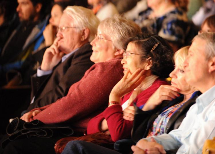 Members of the audience enjoying the Shen Yun show at Canon Theatre in Toronto on Saturday night. (Gordon Yu/The Epoch Times)