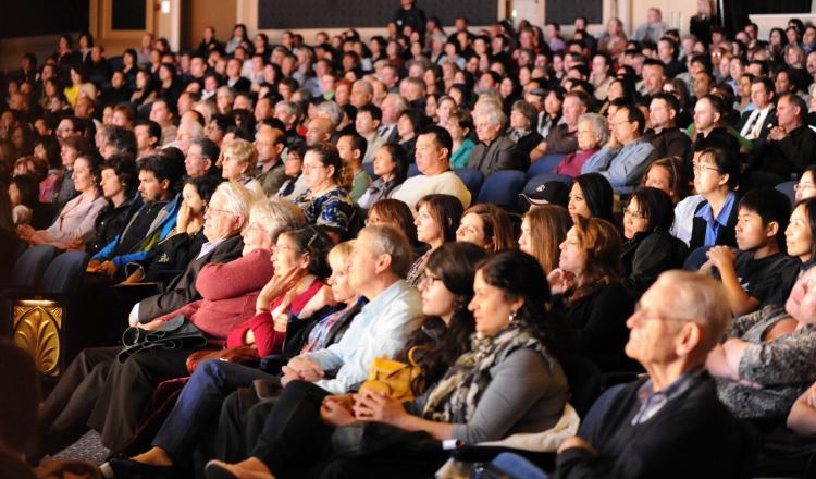 Member of the audience enjoying the Shen Yun show at Canon Theatre in Toronto on Saturday, May 8. (Gordon Yu/The Epoch Times)